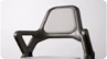 A sculptural charcoal chair with a simple, curved metal frame