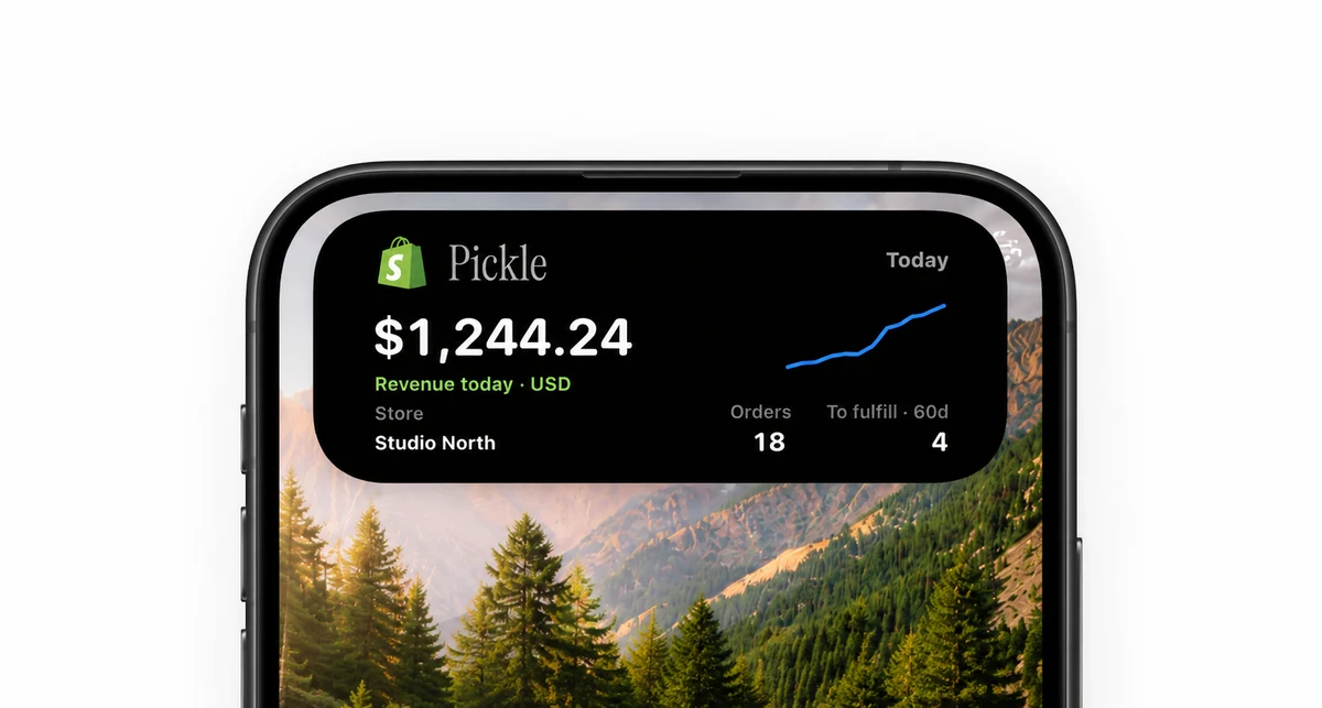 Pickle’s Shopify dashboard on an iPhone, with a mountain landscape wallpaper.